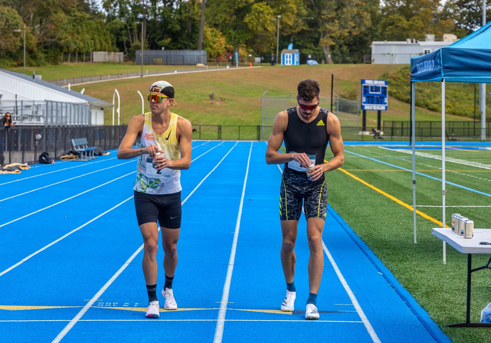 Chris Robertson and Corey Bellemore at the start of the NA Beer Mile