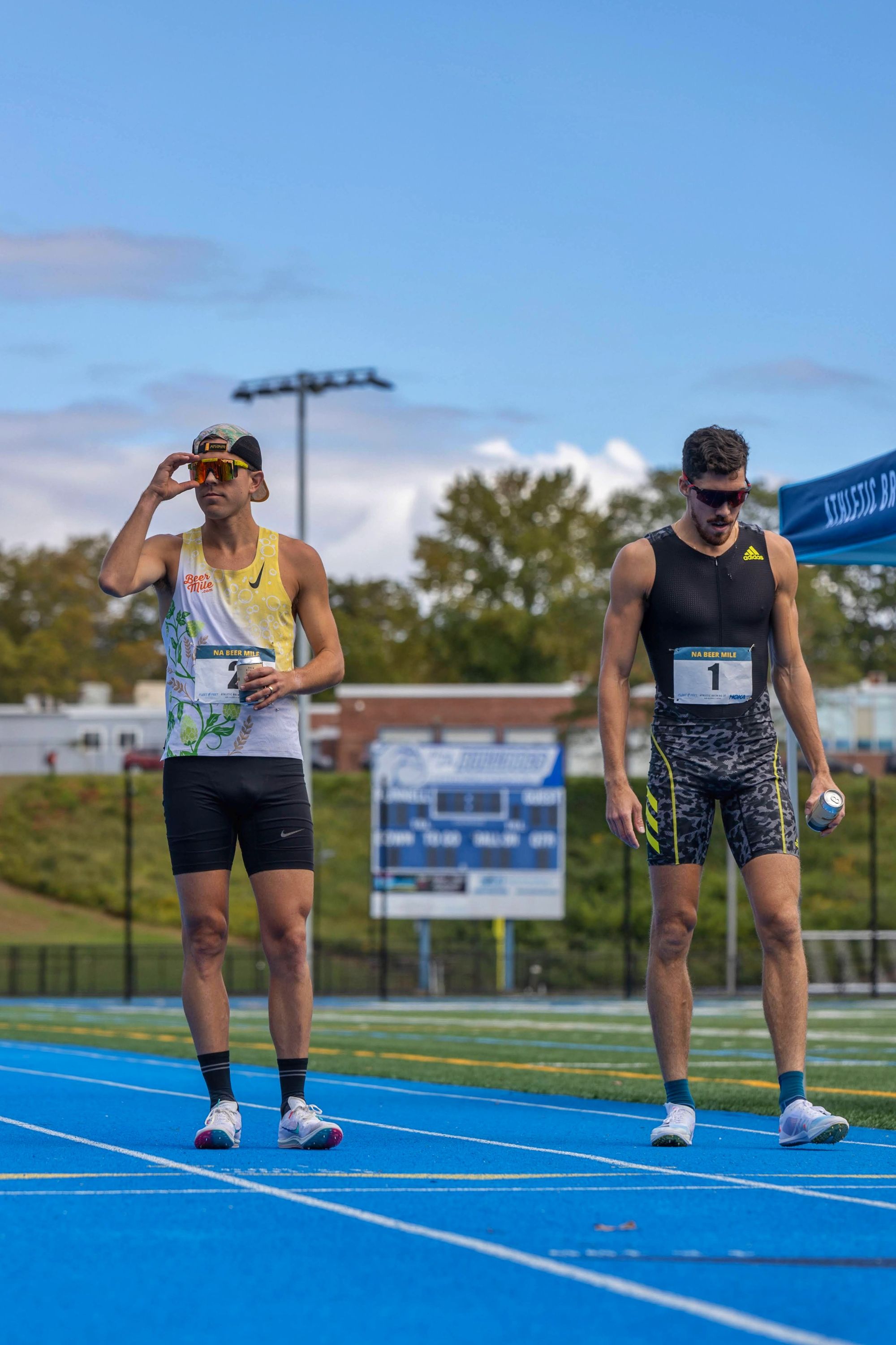 Chris Robertson and Corey Bellemore at the Athletic Brewing NA Beer Mile 2021