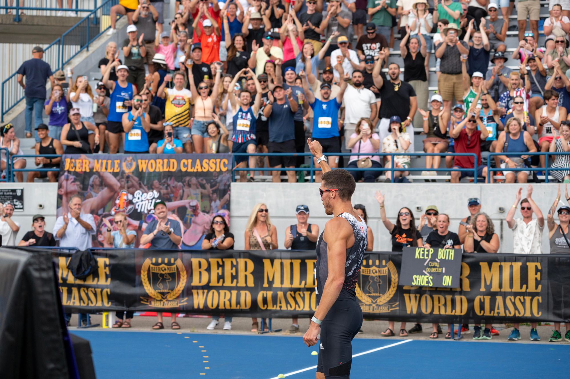 Corey Bellemore acknowledges the crowd after winning the 2024 Beer Mile World Classic